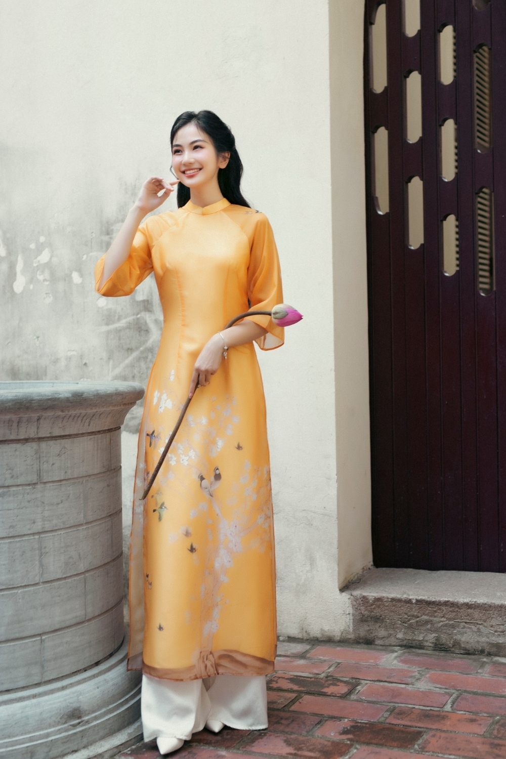  Áo dài Liễu Mai vàng cam 