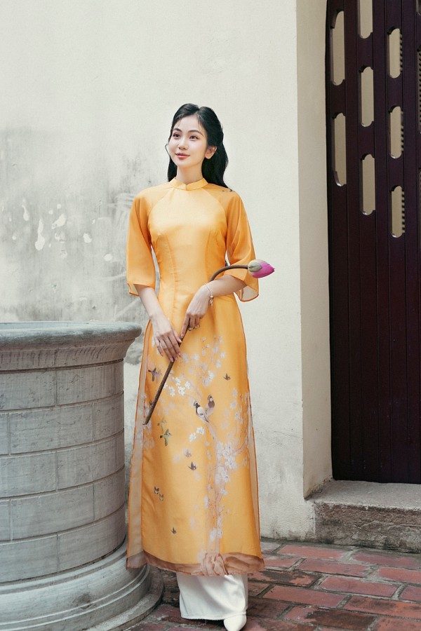  Áo dài Liễu Mai vàng cam 
